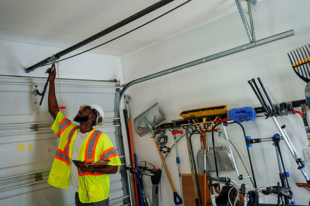 Professional Garage Door Panel Replacement technician working in Adrian, MI